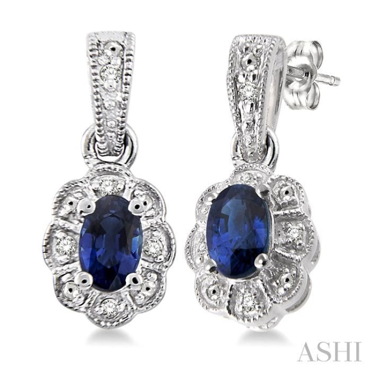 5x3 MM Oval Cut Sapphire and 1/20 ctw Single Cut Diamond Earrings in Sterling Silver 5x3 MM Oval Cut Sapphire and 1/20 ctw Single Cut Diamond Earrings in Sterling Silver