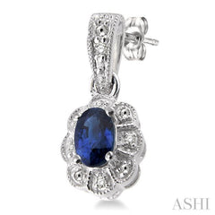 5x3 MM Oval Cut Sapphire and 1/20 ctw Single Cut Diamond Earrings in Sterling Silver 5x3 MM Oval Cut Sapphire and 1/20 ctw Single Cut Diamond Earrings in Sterling Silver