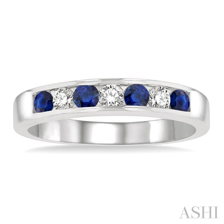 2.5 MM Round Cut Sapphire and 1/5 Ctw Channel Set Round Cut Diamond Band in 14K White Gold 2.5 MM Round Cut Sapphire and 1/5 Ctw Channel Set Round Cut Diamond Band in 14K White Gold