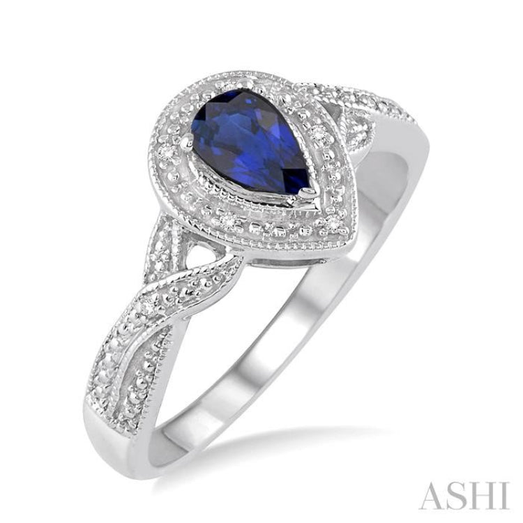 6x4 MM Pear Shape Sapphire and 1/50 ctw Round Cut Diamond Ring in Sterling Silver 6x4 MM Pear Shape Sapphire and 1/50 ctw Round Cut Diamond Ring in Sterling Silver