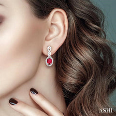 5x3 MM Oval Cut Ruby and 1/6 Ctw Round Cut Diamond Earrings in 14K White Gold 5x3 MM Oval Cut Ruby and 1/6 Ctw Round Cut Diamond Earrings in 14K White Gold