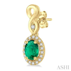 5x3 MM Oval Cut Emerald and 1/6 Ctw Round Cut Diamond Earrings in 10K Yellow Gold 5x3 MM Oval Cut Emerald and 1/6 Ctw Round Cut Diamond Earrings in 10K Yellow Gold
