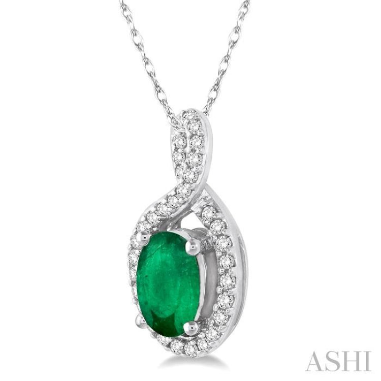6x4 MM Oval Cut Emerald and 1/10 Ctw Round Cut Diamond Pendant in 10K White Gold with Chain 6x4 MM Oval Cut Emerald and 1/10 Ctw Round Cut Diamond Pendant in 10K White Gold with Chain