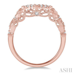 1/5 Ctw Round Cut Diamond Wedding Band in 14K Rose Gold 1/5 Ctw Round Cut Diamond Wedding Band in 14K Rose Gold