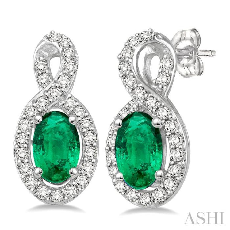 5x3 MM Oval Cut Emerald and 1/5 ctw Round Cut Diamond Earrings in 10K White Gold 5x3 MM Oval Cut Emerald and 1/5 ctw Round Cut Diamond Earrings in 10K White Gold