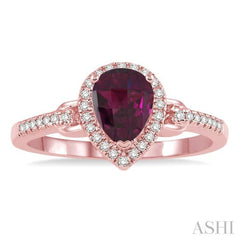 7x5 MM Pear Shape Rhodolite Garnet and 1/6 Ctw Round Cut Diamond Ring in 10K Rose Gold 7x5 MM Pear Shape Rhodolite Garnet and 1/6 Ctw Round Cut Diamond Ring in 10K Rose Gold