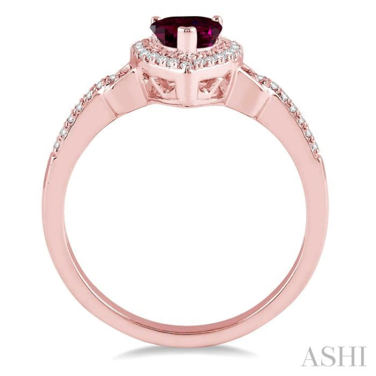 7x5 MM Pear Shape Rhodolite Garnet and 1/6 Ctw Round Cut Diamond Ring in 10K Rose Gold 7x5 MM Pear Shape Rhodolite Garnet and 1/6 Ctw Round Cut Diamond Ring in 10K Rose Gold