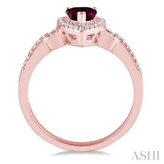 7x5 MM Pear Shape Rhodolite Garnet and 1/6 Ctw Round Cut Diamond Ring in 10K Rose Gold 7x5 MM Pear Shape Rhodolite Garnet and 1/6 Ctw Round Cut Diamond Ring in 10K Rose Gold