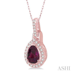 7x5 MM Pear Shape Rhodolite Garnet and 1/10 Ctw Round Cut Diamond Pendant in 10K Rose Gold with Chain 7x5 MM Pear Shape Rhodolite Garnet and 1/10 Ctw Round Cut Diamond Pendant in 10K Rose Gold with Chain
