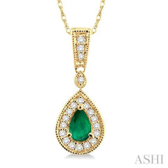 6x4 MM Pear Shape Emerald and 1/6 Ctw Round Cut Diamond Pendant in 14K Yellow Gold with Chain 6x4 MM Pear Shape Emerald and 1/6 Ctw Round Cut Diamond Pendant in 14K Yellow Gold with Chain