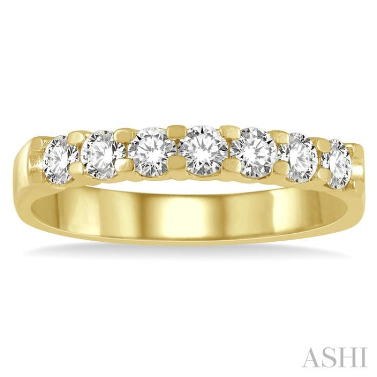 1/2 Ctw 7 Stone Round Cut Diamond Wedding Band in 14K Yellow Gold 1/2 Ctw 7 Stone Round Cut Diamond Wedding Band in 14K Yellow Gold