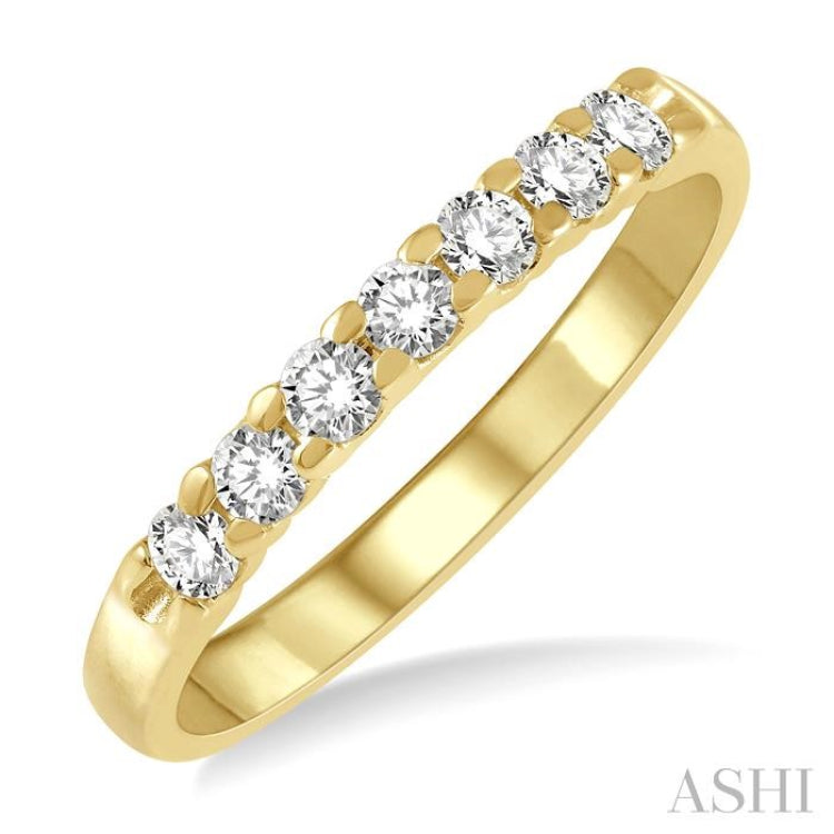 1/3 Ctw 7 Stone Round Cut Diamond Wedding Band in 14K Yellow Gold 1/3 Ctw 7 Stone Round Cut Diamond Wedding Band in 14K Yellow Gold