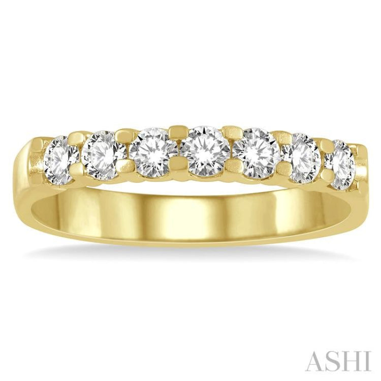 3/4 ctw 7 Stone Round Cut Diamond Wedding Band in 14K Yellow Gold 3/4 ctw 7 Stone Round Cut Diamond Wedding Band in 14K Yellow Gold