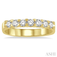 3/4 ctw 7 Stone Round Cut Diamond Wedding Band in 14K Yellow Gold 3/4 ctw 7 Stone Round Cut Diamond Wedding Band in 14K Yellow Gold