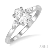 3/4 Ctw Pear and Oval Cut Diamond Ladies Engagement Ring With 1/2 Ct Oval Cut Center Stone in 14K White Gold