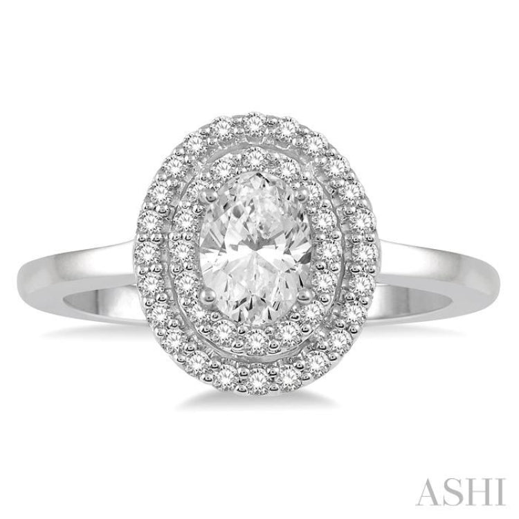1/2 ctw Oval Cut Center Stone and Round Cut Diamond 1/3 ctw Ladies Engagement Ring in 14K White Gold 1/2 ctw Oval Cut Center Stone and Round Cut Diamond 1/3 ctw Ladies Engagement Ring in 14K White Gold
