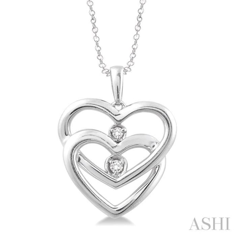 1/20 Ctw Round Cut Diamond Heart Pendant in Sterling Silver with Chain 1/20 Ctw Round Cut Diamond Heart Pendant in Sterling Silver with Chain