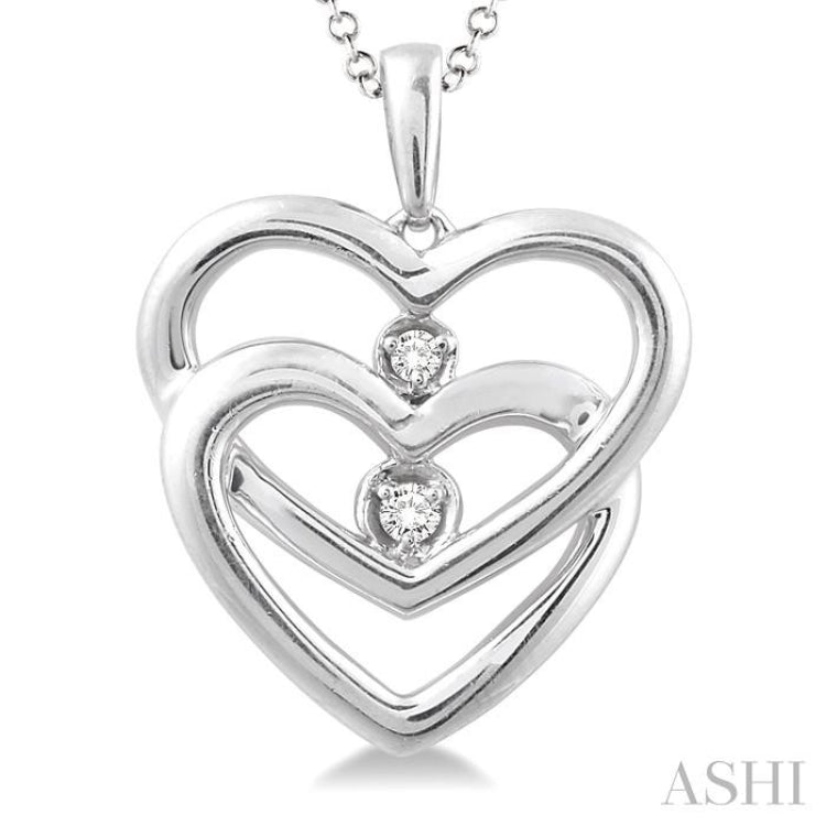 1/20 Ctw Round Cut Diamond Heart Pendant in Sterling Silver with Chain 1/20 Ctw Round Cut Diamond Heart Pendant in Sterling Silver with Chain