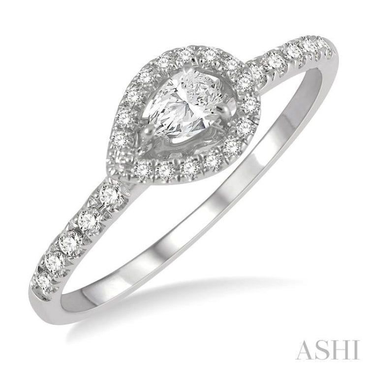 1/4 Ctw Round and Pear Cut Diamond Petite Fashion Ring in 10K White Gold 1/4 Ctw Round and Pear Cut Diamond Petite Fashion Ring in 10K White Gold