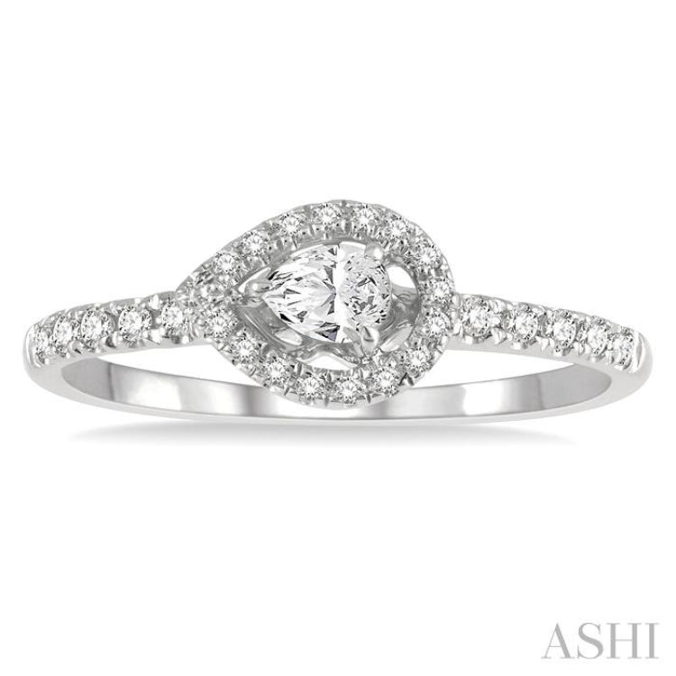 1/4 Ctw Round and Pear Cut Diamond Petite Fashion Ring in 10K White Gold 1/4 Ctw Round and Pear Cut Diamond Petite Fashion Ring in 10K White Gold