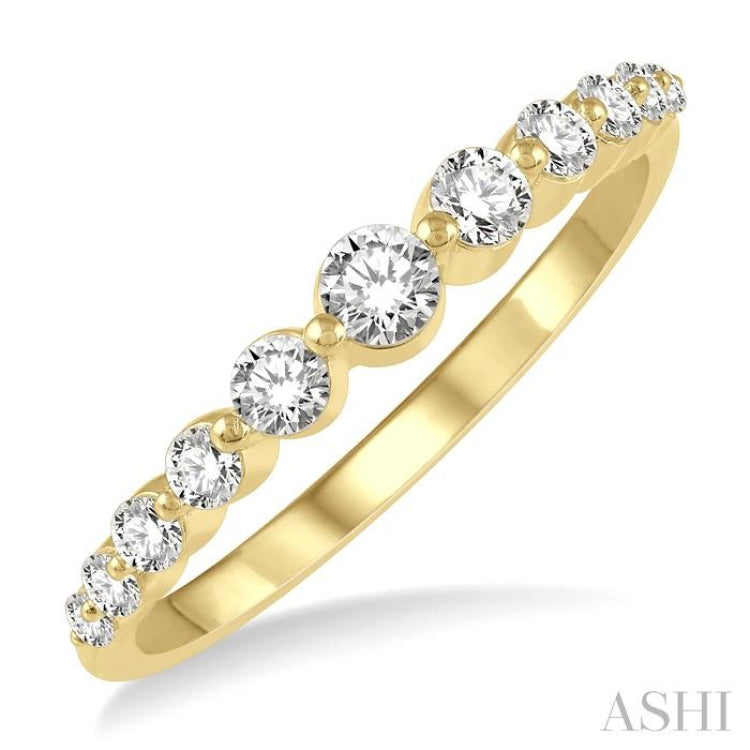1/3 ctw Graduated Round Cut Diamond Fashion Ring in 14K Yellow Gold 1/3 ctw Graduated Round Cut Diamond Fashion Ring in 14K Yellow Gold