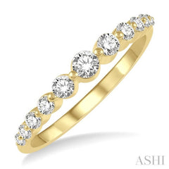 1/3 ctw Graduated Round Cut Diamond Fashion Ring in 14K Yellow Gold 1/3 ctw Graduated Round Cut Diamond Fashion Ring in 14K Yellow Gold