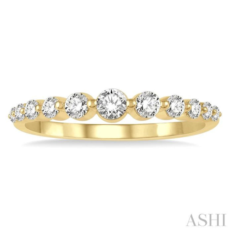 1/3 ctw Graduated Round Cut Diamond Fashion Ring in 14K Yellow Gold 1/3 ctw Graduated Round Cut Diamond Fashion Ring in 14K Yellow Gold
