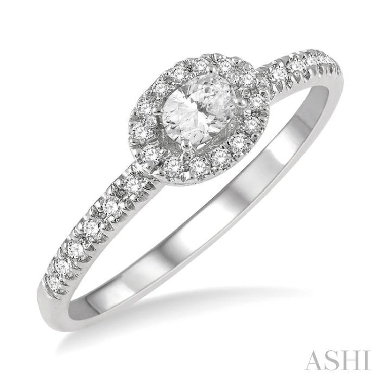 1/3 Ctw Oval Shape Round Cut Diamond Fashion Petite Ring with 1/6 Ct Oval Cut Center Stone in 14K White Gold 1/3 Ctw Oval Shape Round Cut Diamond Fashion Petite Ring with 1/6 Ct Oval Cut Center Stone in 14K White Gold