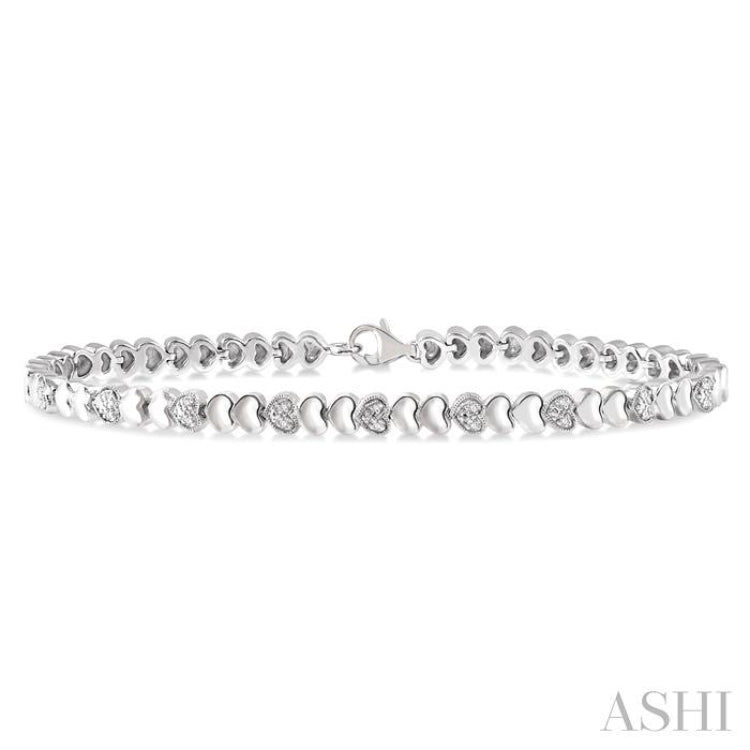 1/6 Ctw Puffed Heart Plain and Single Cut Diamond Fashion Bracelet in Sterling Silver 1/6 Ctw Puffed Heart Plain and Single Cut Diamond Fashion Bracelet in Sterling Silver