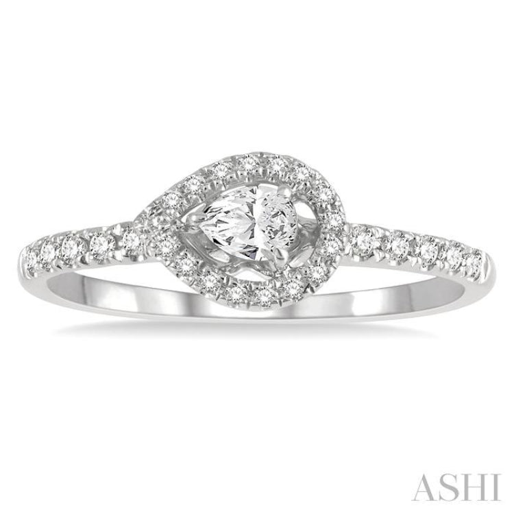 1/4 Ctw Round and Pear Cut Diamond Petite Fashion Ring in 14K White Gold 1/4 Ctw Round and Pear Cut Diamond Petite Fashion Ring in 14K White Gold