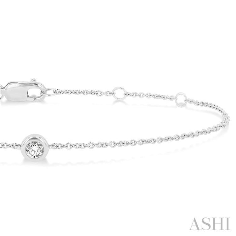 1/10 Ctw Bezel Set Round Cut Diamond Petite Fashion Bracelet in 10K White Gold 1/10 Ctw Bezel Set Round Cut Diamond Petite Fashion Bracelet in 10K White Gold