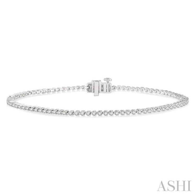 1 Ctw Tri-Prong Round Cut Diamond Tennis Bracelet in 14K White Gold 1 Ctw Tri-Prong Round Cut Diamond Tennis Bracelet in 14K White Gold