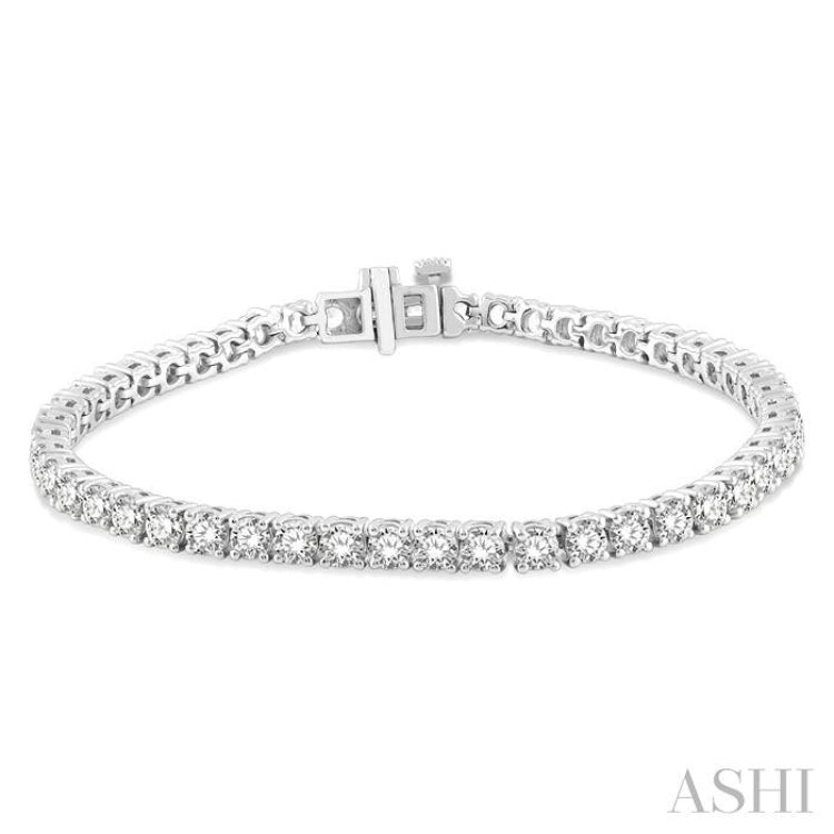 7 Ctw Round Cut Diamond Tennis Bracelet in 14K White Gold 7 Ctw Round Cut Diamond Tennis Bracelet in 14K White Gold