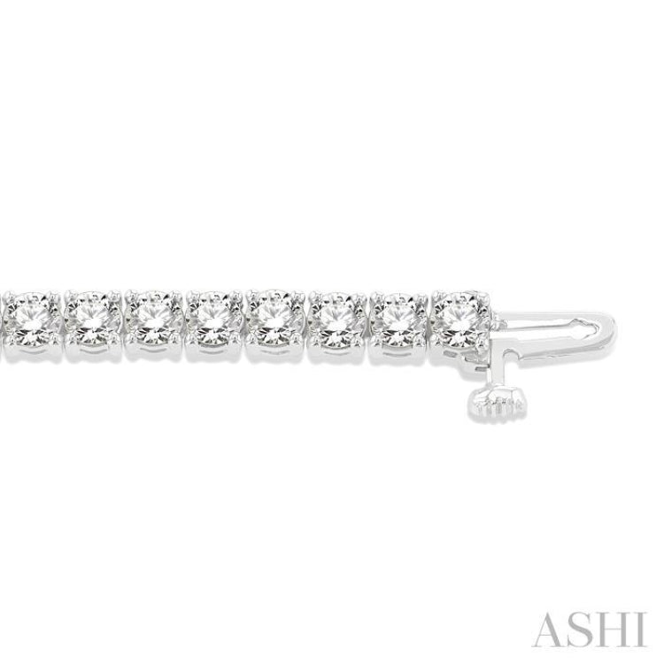 7 Ctw Round Cut Diamond Tennis Bracelet in 14K White Gold 7 Ctw Round Cut Diamond Tennis Bracelet in 14K White Gold