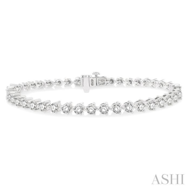 6 Ctw Round Cut Diamond 3-Prong Tennis Bracelet in 14K White Gold 6 Ctw Round Cut Diamond 3-Prong Tennis Bracelet in 14K White Gold