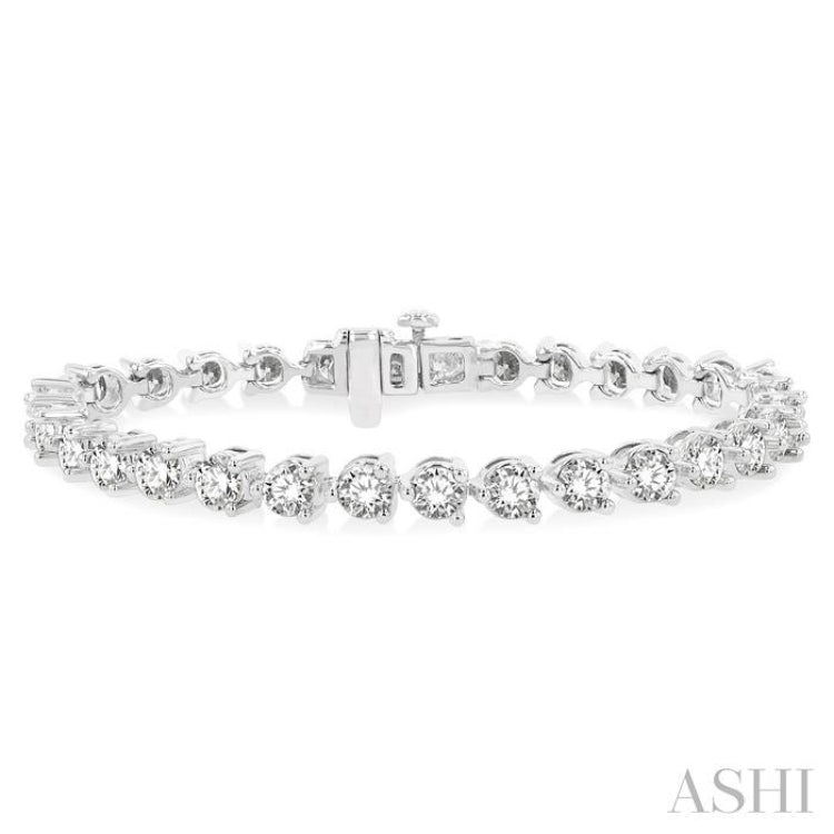9 Ctw 3 Prong Round Cut Diamond Tennis Bracelet in 14K White Gold 9 Ctw 3 Prong Round Cut Diamond Tennis Bracelet in 14K White Gold