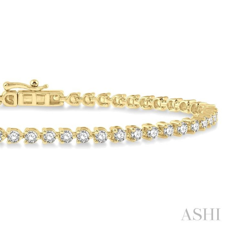 2 Ctw Tri-Prong Round Cut Diamond Tennis Bracelet in 14K Yellow Gold 2 Ctw Tri-Prong Round Cut Diamond Tennis Bracelet in 14K Yellow Gold