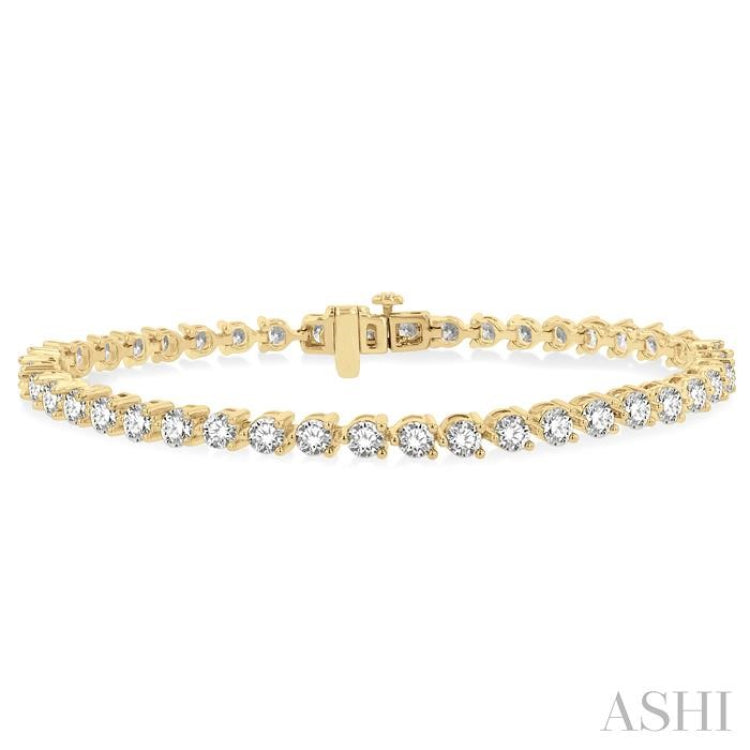 5 Ctw Round Cut Diamond 3-Prong Tennis Bracelet in 14K Yellow Gold 5 Ctw Round Cut Diamond 3-Prong Tennis Bracelet in 14K Yellow Gold
