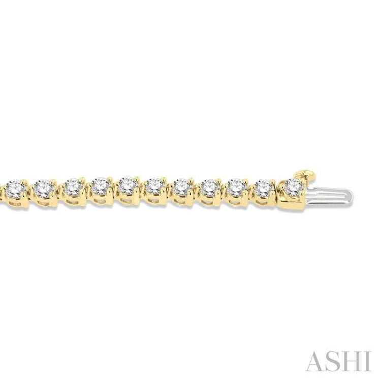 5 Ctw Round Cut Diamond 3-Prong Tennis Bracelet in 14K Yellow Gold 5 Ctw Round Cut Diamond 3-Prong Tennis Bracelet in 14K Yellow Gold