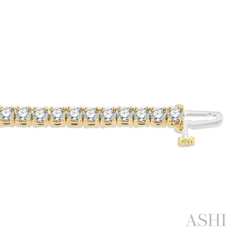 5 Ctw Round Cut Diamond Tennis Bracelet in 14K Yellow Gold 5 Ctw Round Cut Diamond Tennis Bracelet in 14K Yellow Gold
