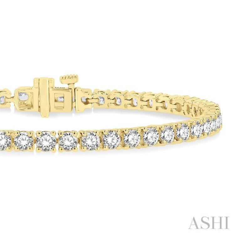 7 Ctw Round Cut Diamond Tennis Bracelet in 14K Yellow Gold 7 Ctw Round Cut Diamond Tennis Bracelet in 14K Yellow Gold