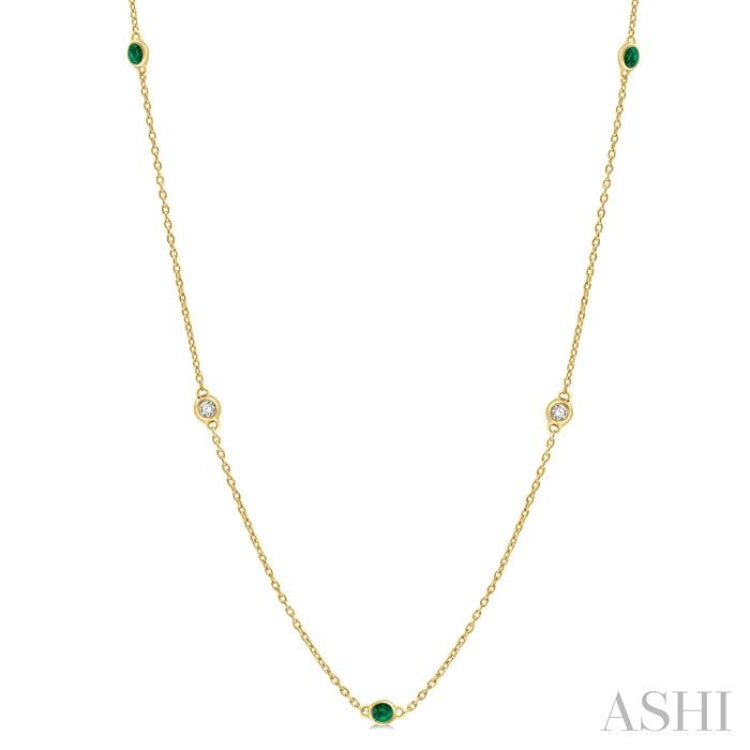 1.75 MM Emerald and 1/6 Ctw Round Cut Diamond Precious Station Necklace in 14K Yellow Gold 1.75 MM Emerald and 1/6 Ctw Round Cut Diamond Precious Station Necklace in 14K Yellow Gold
