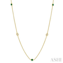 1.75 MM Emerald and 1/6 Ctw Round Cut Diamond Precious Station Necklace in 14K Yellow Gold 1.75 MM Emerald and 1/6 Ctw Round Cut Diamond Precious Station Necklace in 14K Yellow Gold