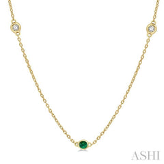 1.75 MM Emerald and 1/6 Ctw Round Cut Diamond Precious Station Necklace in 14K Yellow Gold 1.75 MM Emerald and 1/6 Ctw Round Cut Diamond Precious Station Necklace in 14K Yellow Gold