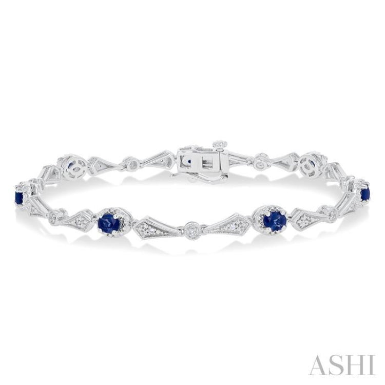 4X3 MM Oval Cut Sapphire and 1/10 Ctw Round Cut Diamond Precious Bracelet in 10K White Gold 4X3 MM Oval Cut Sapphire and 1/10 Ctw Round Cut Diamond Precious Bracelet in 10K White Gold