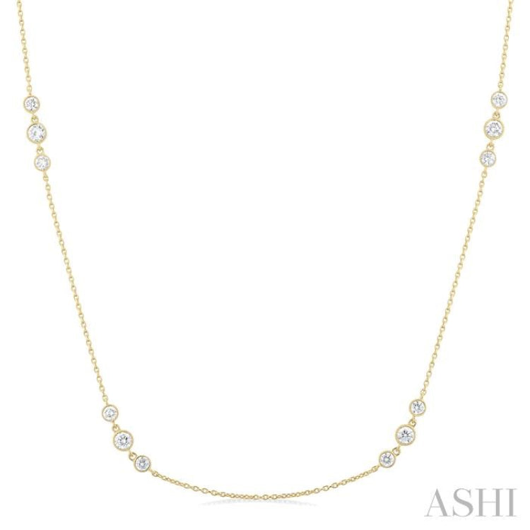 3/4 Ctw Three Stone Bezel Set Round Cut Diamond Station Necklace in 14K Yellow Gold 3/4 Ctw Three Stone Bezel Set Round Cut Diamond Station Necklace in 14K Yellow Gold