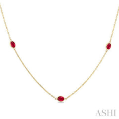 4x3 MM Oval Cut Ruby Precious Station Necklace in 14K Yellow Gold 4x3 MM Oval Cut Ruby Precious Station Necklace in 14K Yellow Gold
