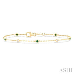 1.8 MM Emerald and 1/10 Ctw Bezel Set Round Cut Diamond Precious Gemstone Station Bracelet in 14K Yellow Gold 1.8 MM Emerald and 1/10 Ctw Bezel Set Round Cut Diamond Precious Gemstone Station Bracelet in 14K Yellow Gold