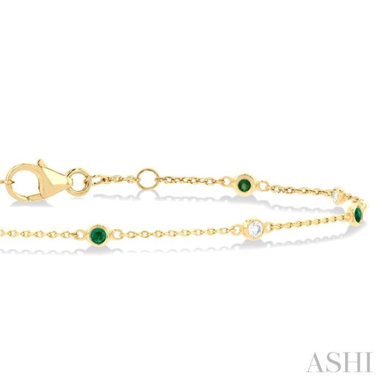 1.8 MM Emerald and 1/10 Ctw Bezel Set Round Cut Diamond Precious Gemstone Station Bracelet in 14K Yellow Gold 1.8 MM Emerald and 1/10 Ctw Bezel Set Round Cut Diamond Precious Gemstone Station Bracelet in 14K Yellow Gold