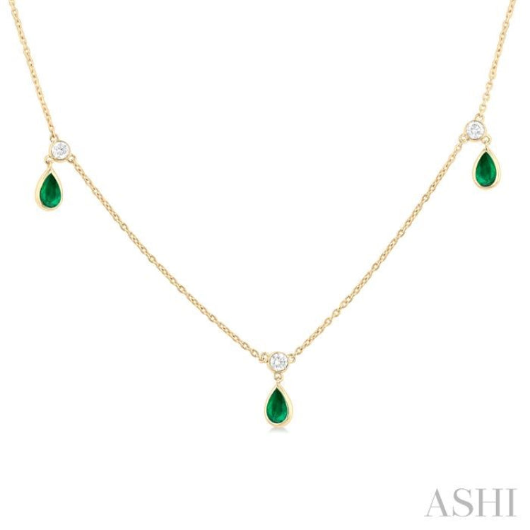 5x3 MM Pear Shape Emerald and 1/4 Ctw Round Cut Diamonds Precious Station Necklace in 14K Yellow Gold 5x3 MM Pear Shape Emerald and 1/4 Ctw Round Cut Diamonds Precious Station Necklace in 14K Yellow Gold